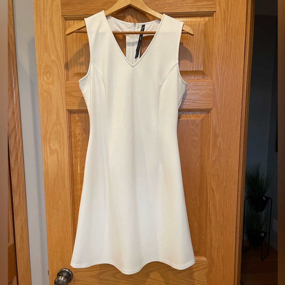 White sleeveless Marc New York Dress Size 6
Asymmetrical Back